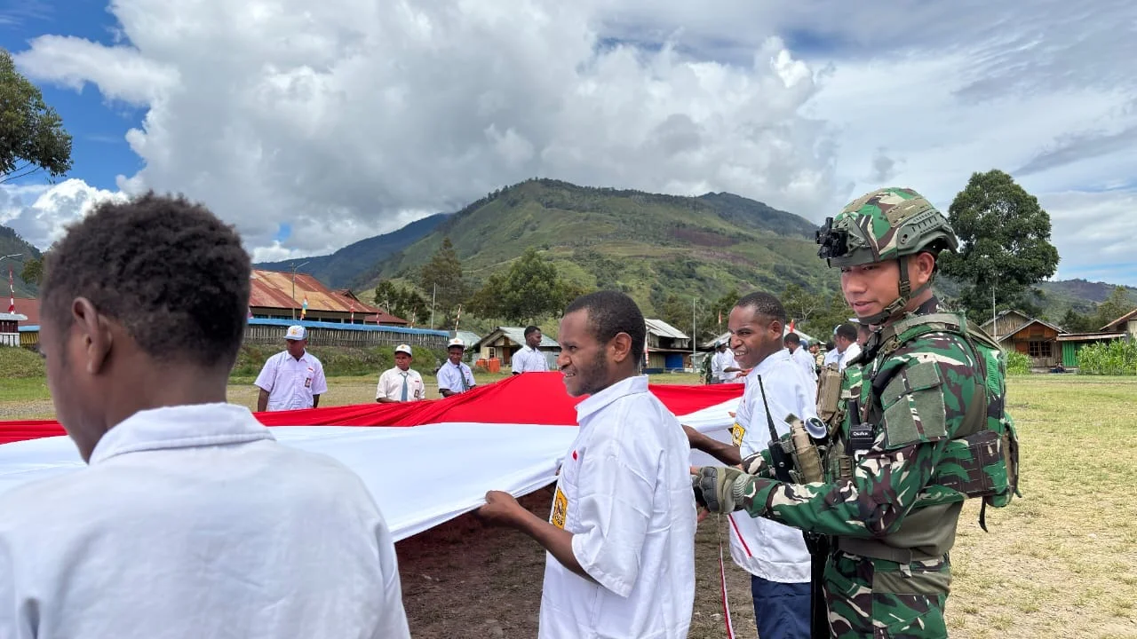 Merah Putih Berkibar di Puncak Bukit Timothy, Semangat Kemerdekaan Menggema di Ilu